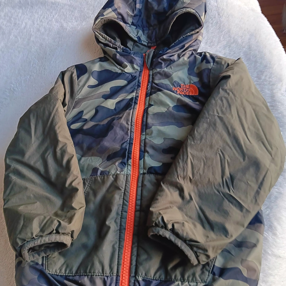 The North Face Camouflage Jacket with Orange Zipper